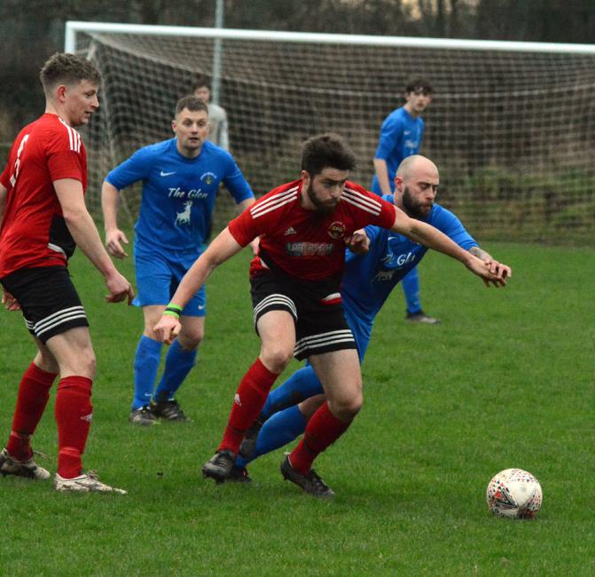 Greg Brown in possession for Clarby Road against Wizards